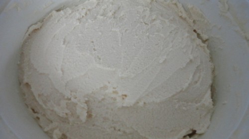 The cookie batter has the consistency of a dough. It is thick and smooth.