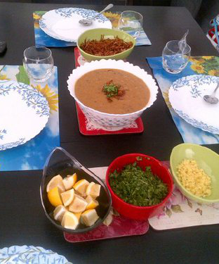 Hyderabadi Haleem served with garnish Hyderabadi Haleem served with garnish